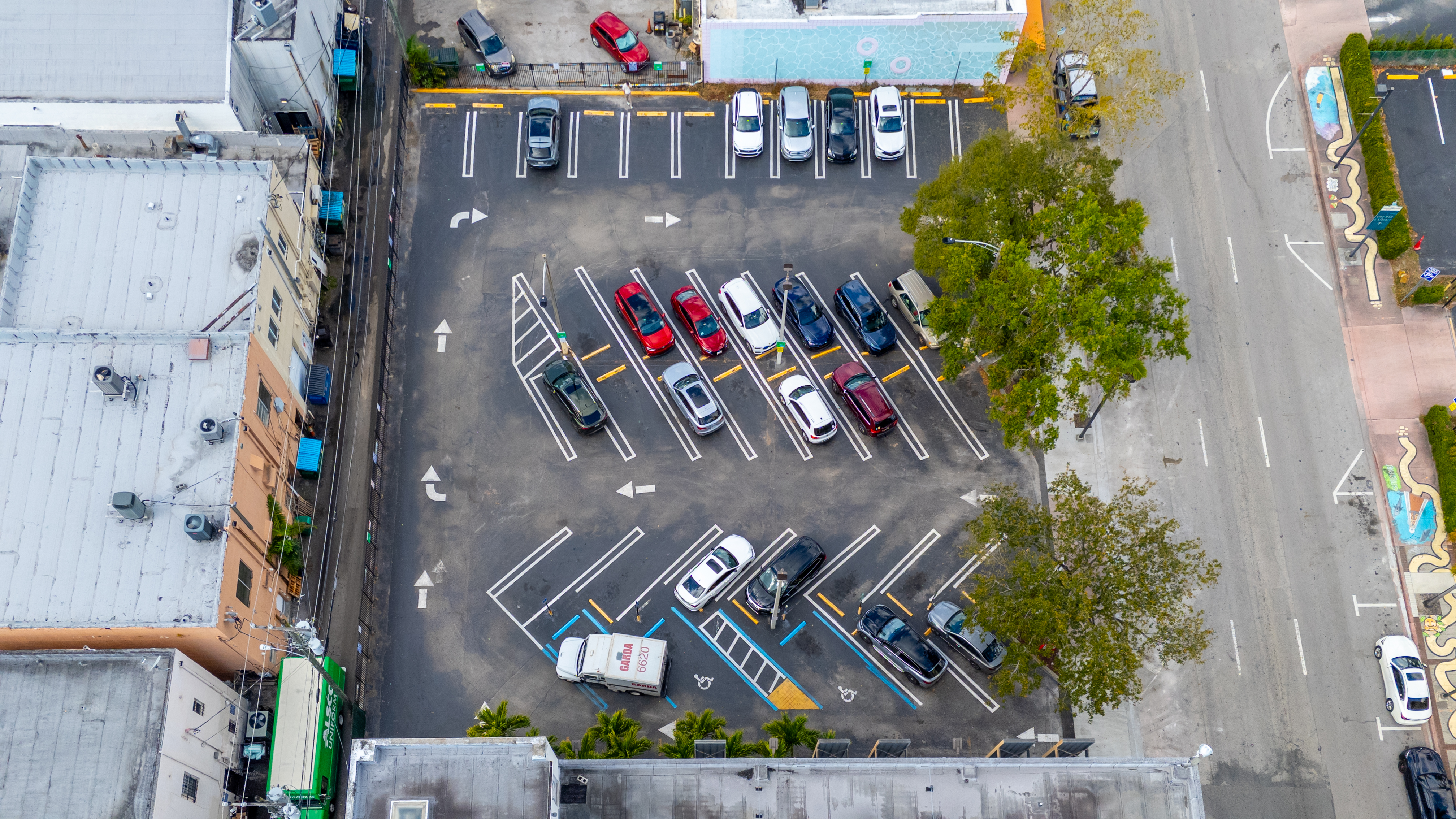 Aerial view of the building and parking