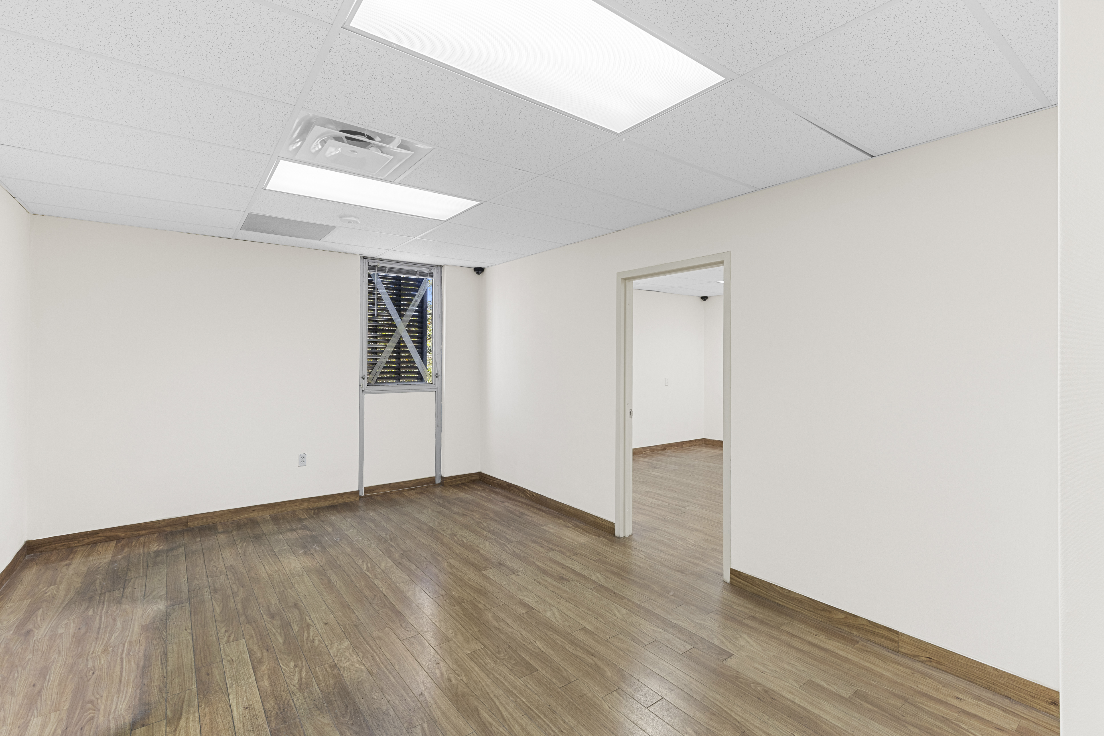 Private office with connecting doorway