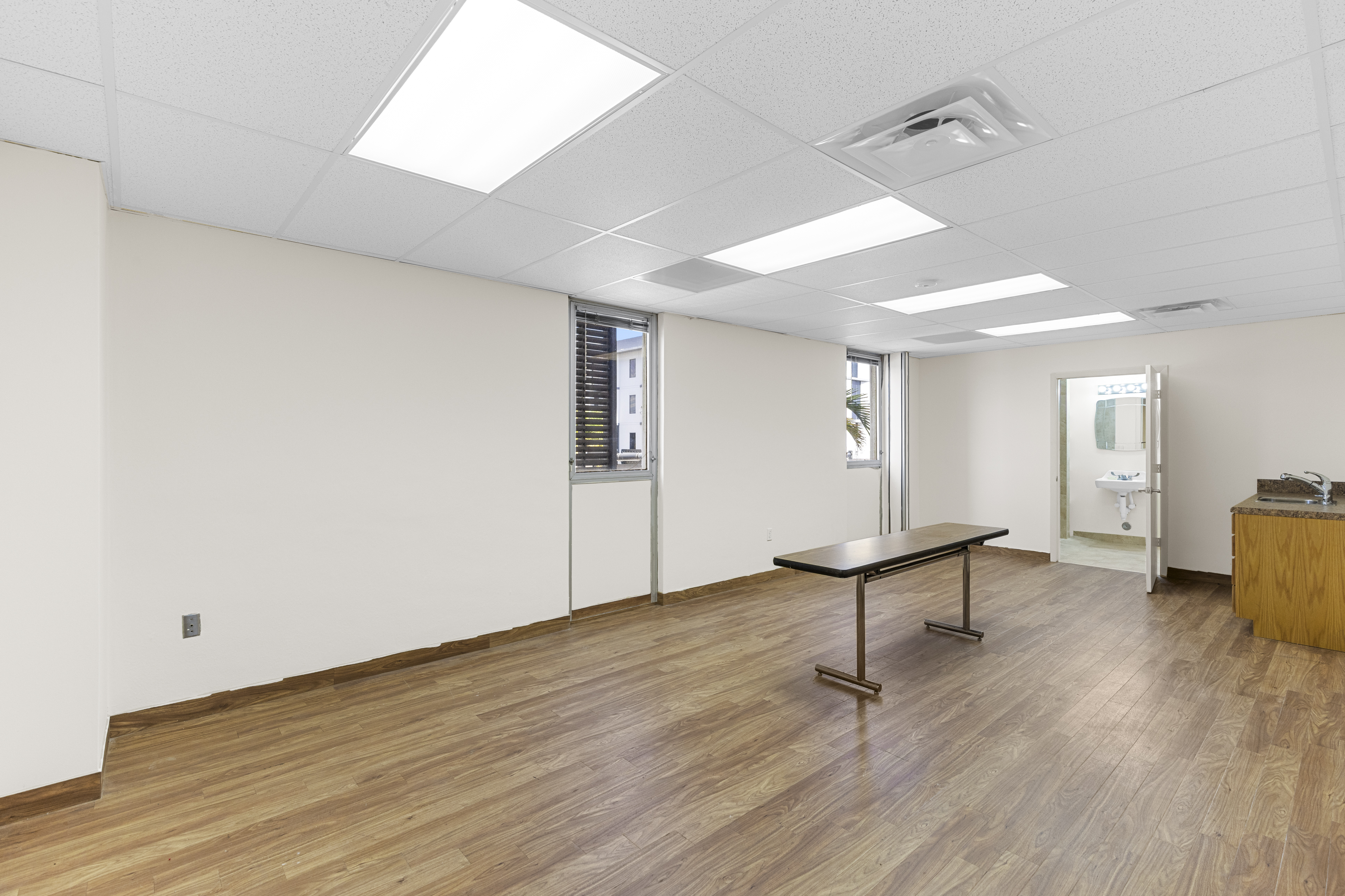 Windowed room with bathroom access